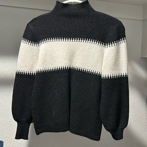 Black with white stripe sweater. Mock turtle neck